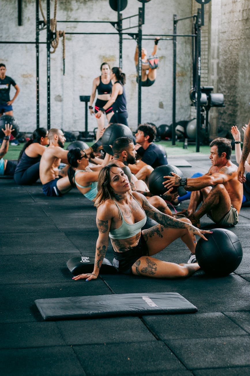 a group of people doing crossfit in a gym